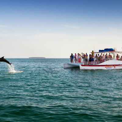 a small boat in a large body of water